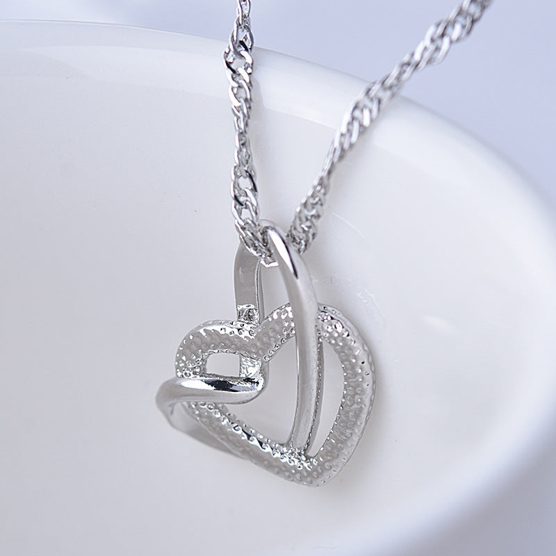 💞Interlocking Heart Necklace -👩‍❤️‍👩''God put us together to be sisters by heart''💝