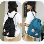 Folding Embroidered Drawstring Backpack