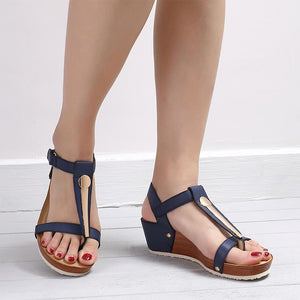 Fashionable sandal with metal and Velcro closure