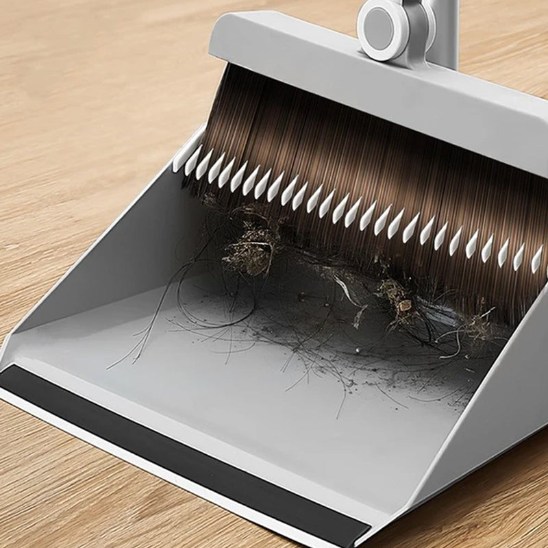 "Built-In Comb" Rotating Broom